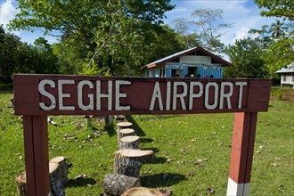 Sign of the very small Seghe airport