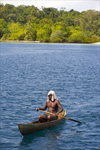 Man paddling in his canoe