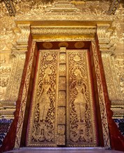 Gilded entrance doors of Wat Mai Temple