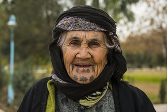Syrian Orthodox Kurdish woman with tattoos on her face
