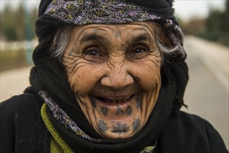 Syrian Orthodox Kurdish woman with tattoos on her face