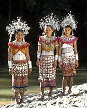 Women of the ethnic group of the Iban people wearing traditional dress