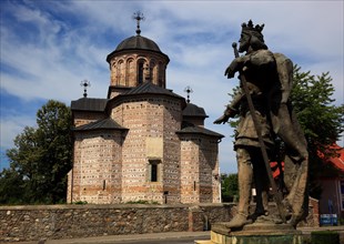 Princely Church of St Nicholas Curtea de Arges with a statue of Basarabs