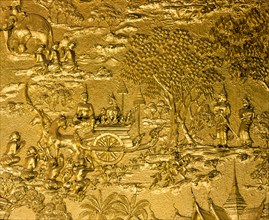 Gilded relief on the facade of Wat Mai Temple