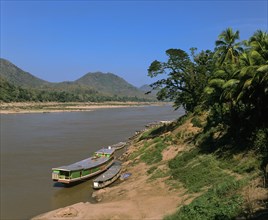 Boats on the shore of the Mekong River