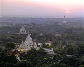 View from Sagaing Hill over pagodas at sunset