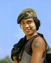 Patriotic young man with thanaka paste on his face