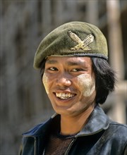 Patriotic young man with thanaka paste on his face