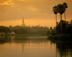 Lake Kandawgyi with Shwedagon Pagoda at twilight
