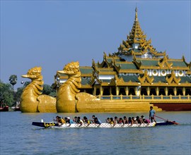 Dragon boat on Lake Kandawgyi in front of the Karaweik ship restaurant