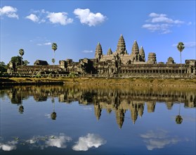 Temple of Angkor Wat reflected in a pond
