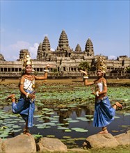 Temple dancers or apsaras at the Lotus Pond in front of the temple of Angkor Wat