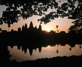Main temple of Angkor Wat reflected in a pond