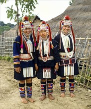 Three Akha girls in a mountain village