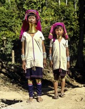 Long-necked woman and a girl of the Padaung mountain tribe