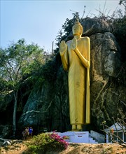 Golden Buddha statue at Kao Takiap Temple