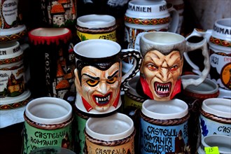 Mugs with Dracula designs in a souvenir shop at Bran Castle