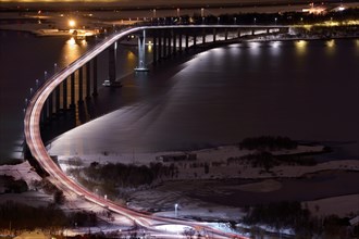 Bridge over fjord at night