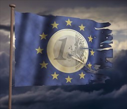 Euro coin on EU Flag