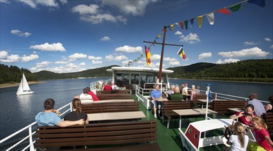 People on the top deck of the excursion ship Westfalen on the Bigge reservoir