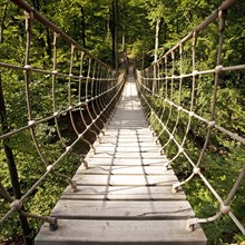 Suspension bridge along the Waldskulpturenweg forest sculpture trail in Wittgenstein-Sauerland