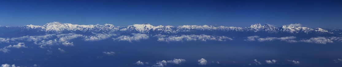 Mountain range of the Himalayas from a plane