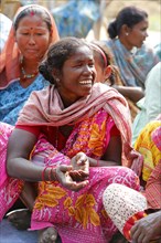 Women taking part in a village assembly