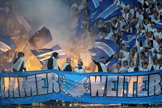Hoffenheim fans igniting flares