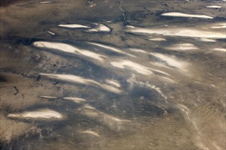 Low coastal dunes and barren desert land in the Namib Desert