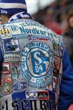 Fan of FC Schalke 04 football club wearing a 'fan jacket'