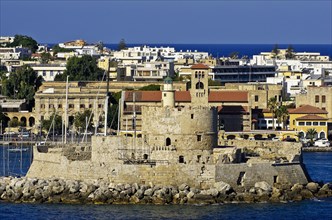 Harbour entrance of Rhodes in front of the fortified tower of Agios Nikolaos
