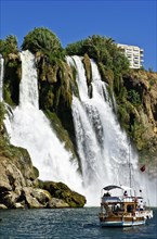 Waterfalls and a residential building on the Turkish Riviera in Antalya