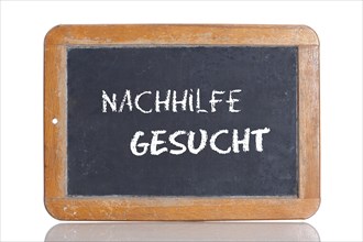 Old school blackboard with the words NACHHILFE GESUCHT