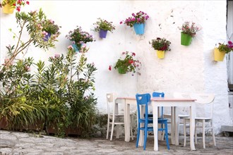 Cafe decorated with flowers on the wall
