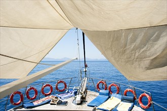 Set sail and life rings on a cruise ship in the Turkish Aegean Sea