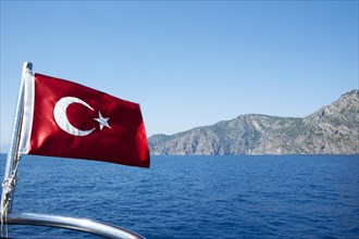 Turkish flag on a cruise ship in the Turkish Aegean Sea