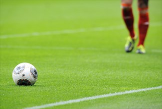 Bundesliga football 'Torfabrik' and legs of a player