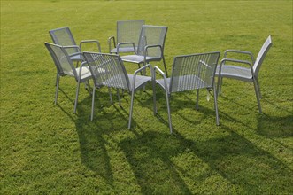 Garden chairs on a lawn