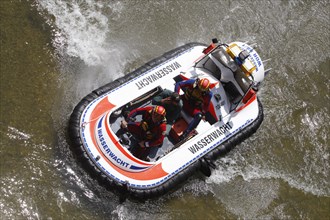 Airboat of the Wasserwacht lifeguard service during an exercise on the Isar River