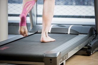 Detail of a running exercise on a treadmill