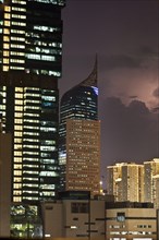 High-rise buildings in front of storm clouds