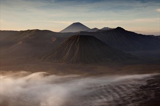 Morning fog in the Tengger Caldera with Mount Bromo volcano