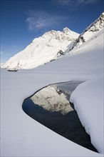 The Hoher Riffler reflected in a lake
