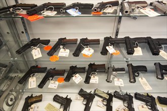 Handguns on display at the Huron Valley Guns store on Gun Appreciation Day