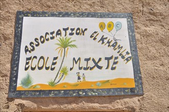 Hand painted sign of a school
