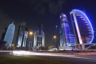 Skyline of Doha at night with Palm Tower 1 and 2