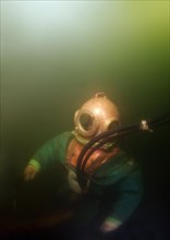 Professional diver checking a pipeline