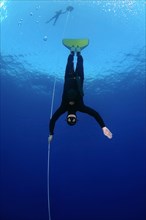 Freediver wearing a monofin
