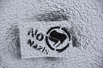 Stencil on a wall "No Nazis"