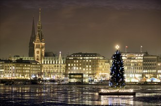 Binnenalster or Inner Alster Lake with a Christmas tree and City Hall